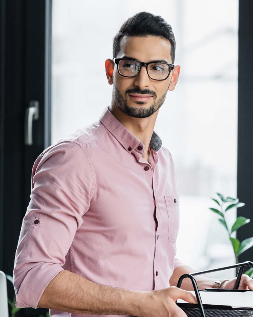 arabian businessman holding tray with papers near e9zxf5u.jpg