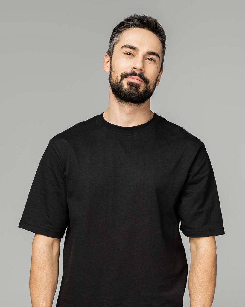 confident and relaxed bearded and brunette man in r9gdwr6.jpg